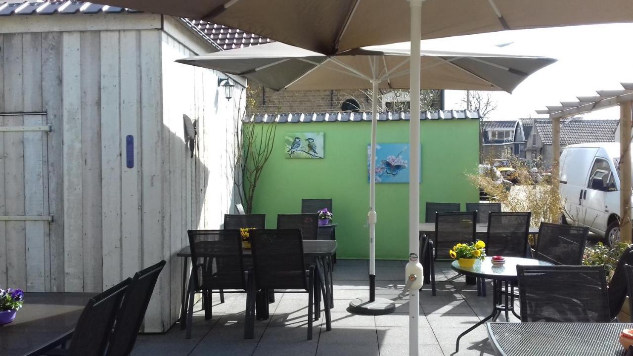 Eetcafe/Pension Nooitgedacht Strijen Exterior foto