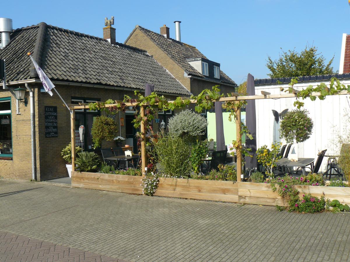 Eetcafe/Pension Nooitgedacht Strijen Exterior foto
